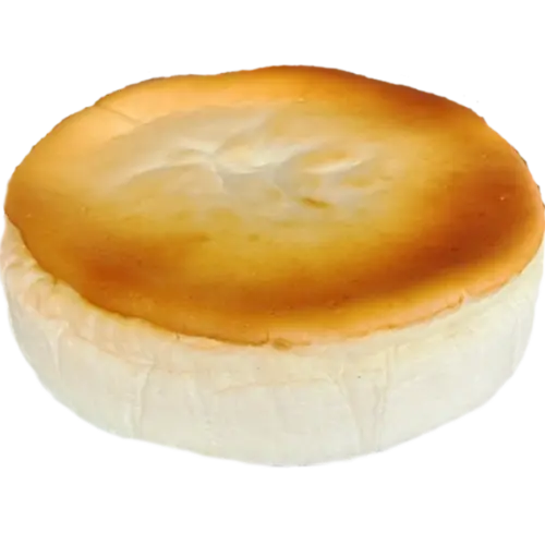 Deutscher Käsekuchen ohne Boden mit goldbrauner Oberfläche und cremiger Füllung