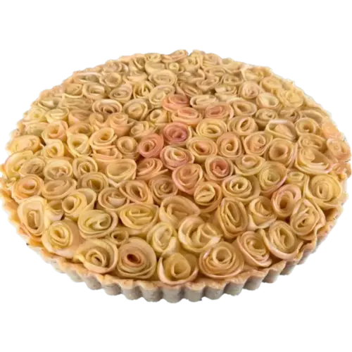 Apfelrosen-Tarte mit dicht gesetzten Apfelrosen aus feinen Apfelscheiben in einer runden Tarteform.