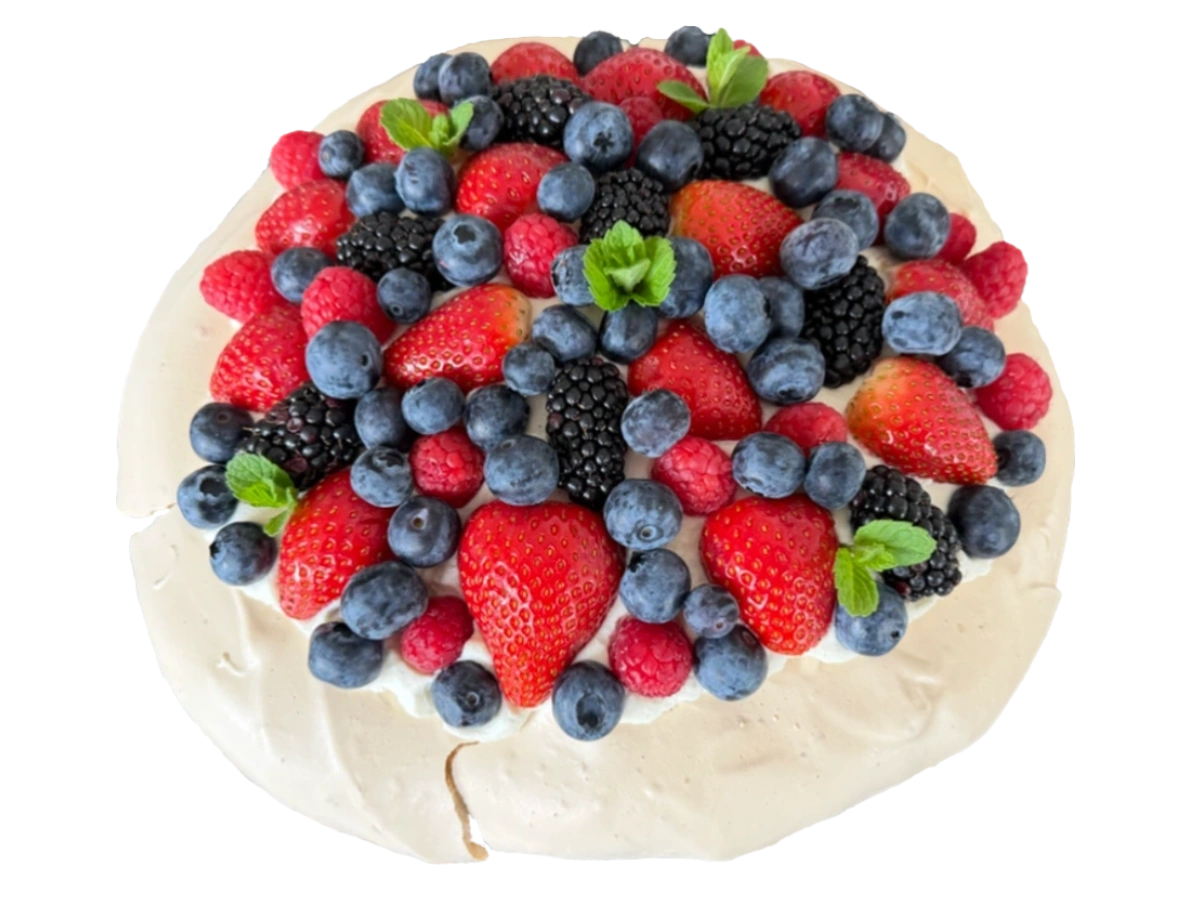 Pavlova cake with fresh berries and crisp meringue shell