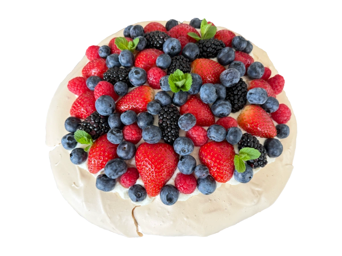 Pavlova cake with fresh berries and crisp meringue shell
