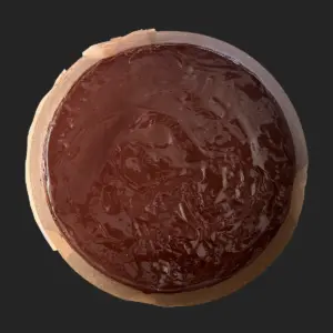 Zartbitter Ganache aufgetragen
